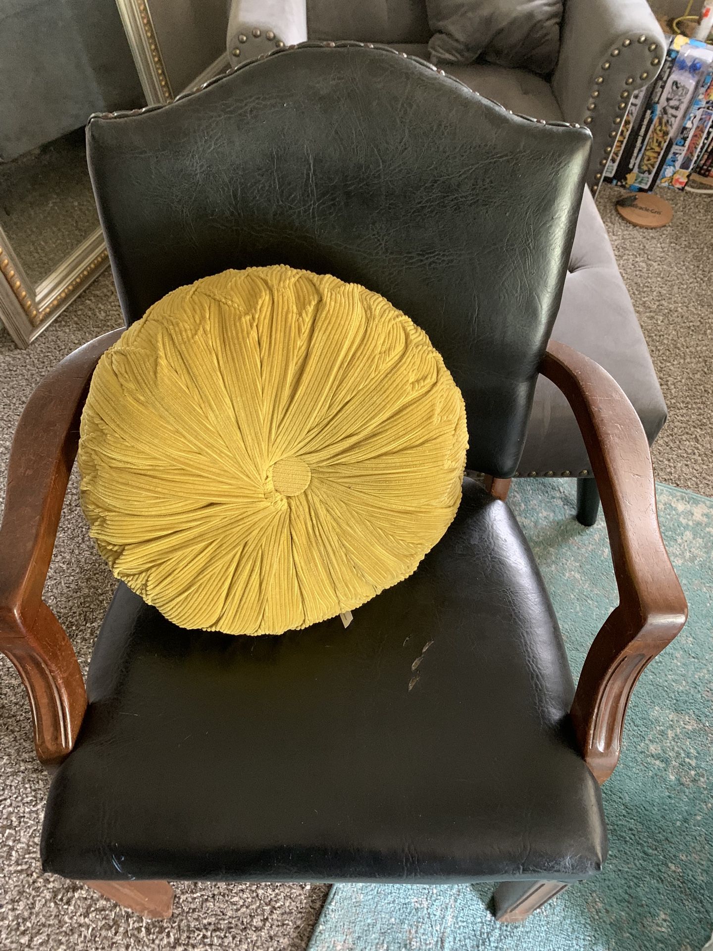 Black Leather armchair with solid oak arms