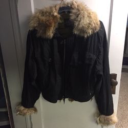 Fox fur-trimmed winter jacket.