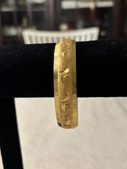 Monet Gold Toned Brass Bangle 