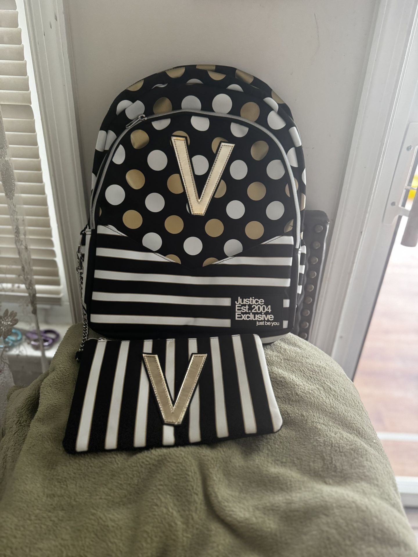 Justice book bags with detachable Wristlet