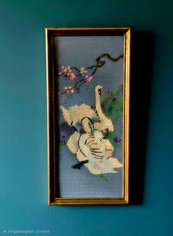 vintage needlepoint artwork featuring two white swans on a blue background 8.5"×17.5"