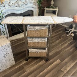 Collapsible ironing board cart with three wicker baskets and laundry hamper