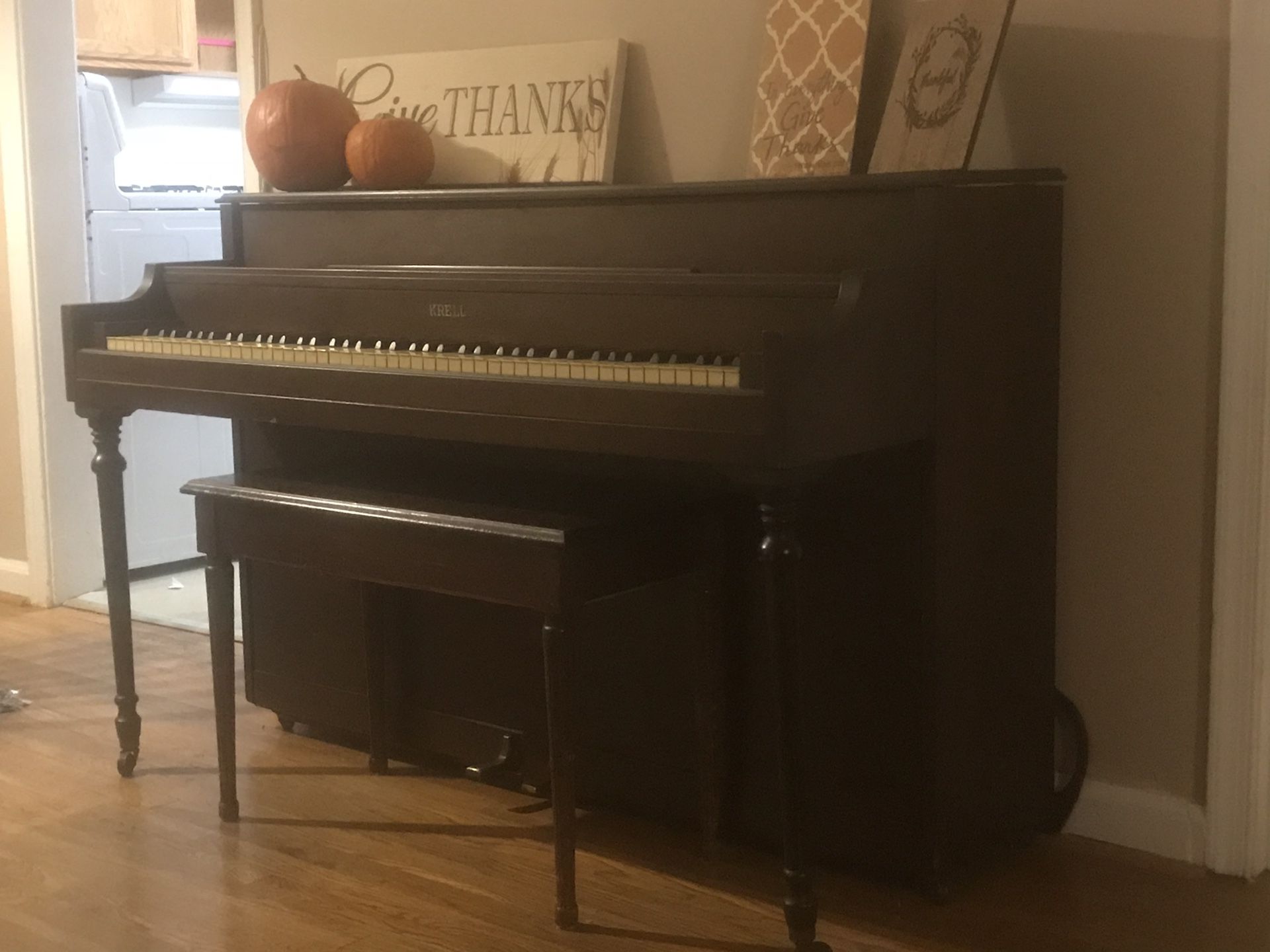 Antique piano with real ivory keys