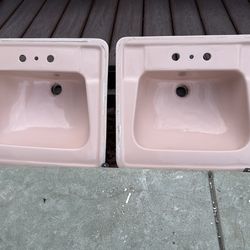 Vintage 1956 & 1957 matching pair of Pink Bathroom Sinks