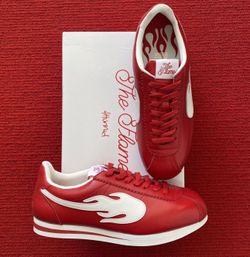 Red and white “The Flames” by YG