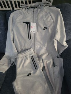 GREY NIKE
