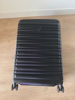 Delsey Paris Check In Suitcase