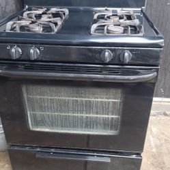 BLACK STOVE, DELIVERED AND INSTALLED.