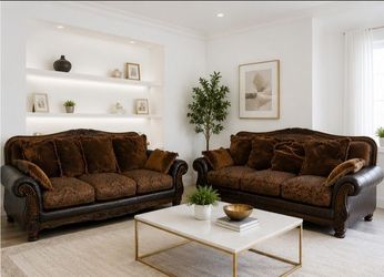 2 Brown Traditional Sofas with 3 Seat Cushions and 11 pillows($150 For Each Couch)
