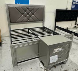 Gray or black King bed with nightstand