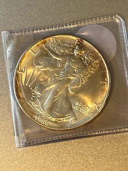 1986 SILVER EAGLE COIN. First YEAR OUT. One Ounce Pure Silver