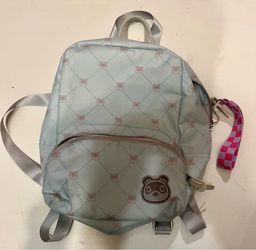 The JanSport Blue/Black Galaxy Stars Large Polyester Zip Backpack is a stylish and functional backpack perfect for travel and casual occasions. Featur