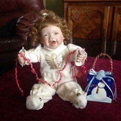Ashton-Drake Porcelain Poseable Doll “My First Christmas".Excellent condition!