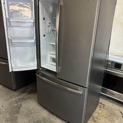 Near New GE counter depth Frenchdoor 21.3 ft.³ Water and ice inside can deliver Retail price $2900 23.1 cu. ft. French Door Refrigerator in Slate, Fin