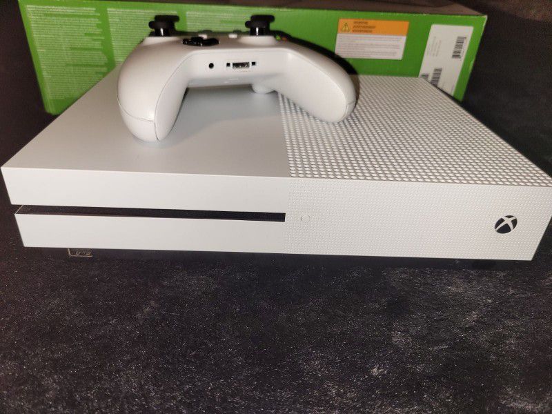 xbox one s am giving it out to bless someone who first wish me happy wedding anniversary on my cellphone number now  707^340^9916