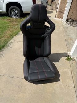 Black Racing Bucket Seat with Red Stitching and Carbon Fiber Back