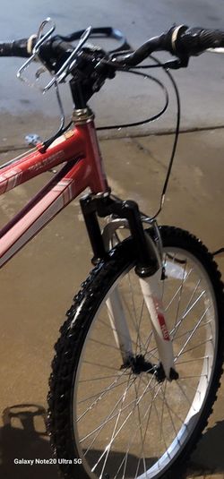 24" 7 speed Red and pink Mountain Bike with Front Suspension