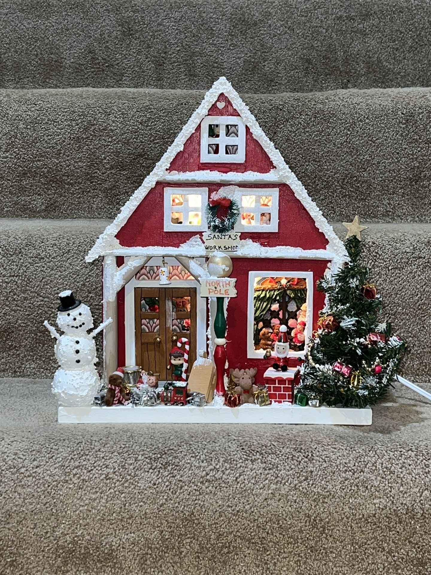 Folk art Handmade Vintage Light up Santa’s workshop wooden village 13” tall