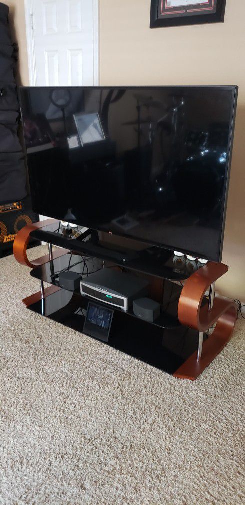 LG 60 inch TV and TV stand 