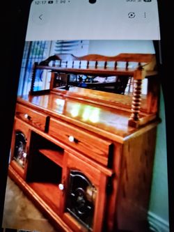 Dry bar, perfect, oak.Heavy mirror is perfect , all doors and drawers work perfect