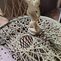 Man Throwing Sculpture