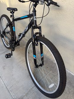 Huffy Mountain Bike Black and Blue- 29” tires / 18 speed