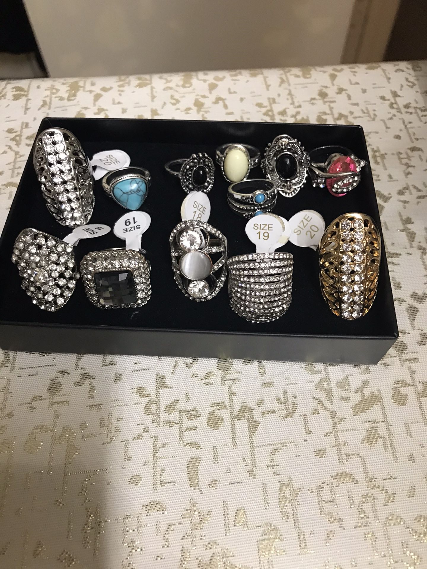 12 ladies rings plated silver custom jewelry size 6,7,8,9,10 still available for pick up in Gaithersburg md20877