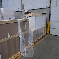 Two skids of brand new cabinets