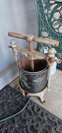 antique cast iron fruit and lard press