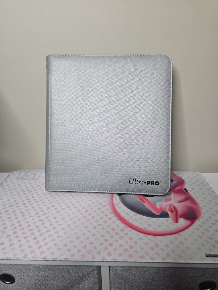 Ultra Pro Fire Proof Binder With Few Pokemon Cards 