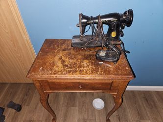 Singer seeing machine with desk