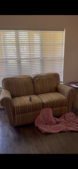 Loveseat manual recliner on both sides