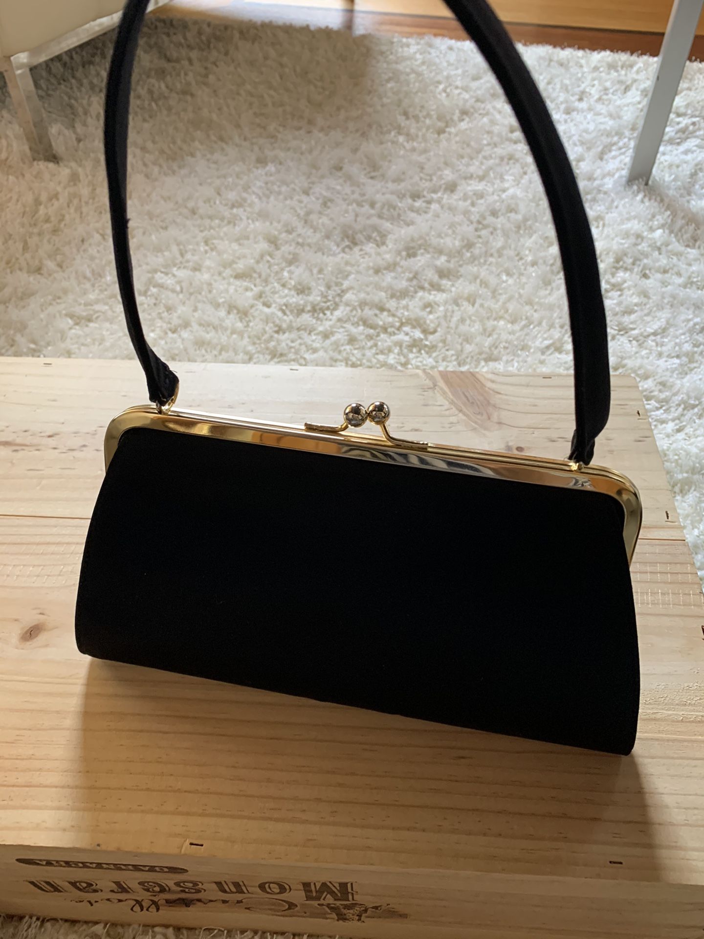 Authentic CASADEL black clutch