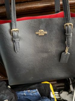 Bolsa coach esta casi nueva se uso tres veses