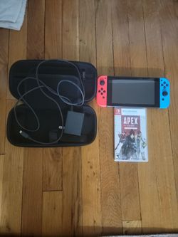 Nitendo Switch With Apex legends, a Case, and a charger