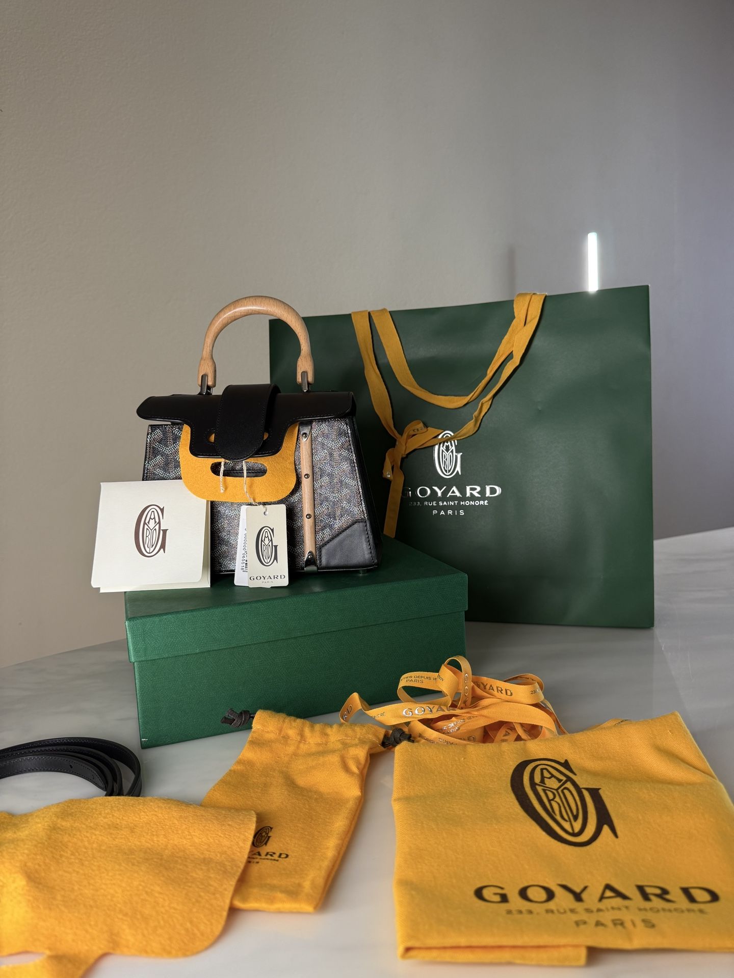 BRAND NEW REAL Goyard Saigon Mini Structured bag in black Goyardine canvas with Cervon calfskin, wooden top handle front panels with palladium studs