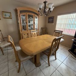 Dining Room With 6 Chairs And china cabinet With Table Expander.