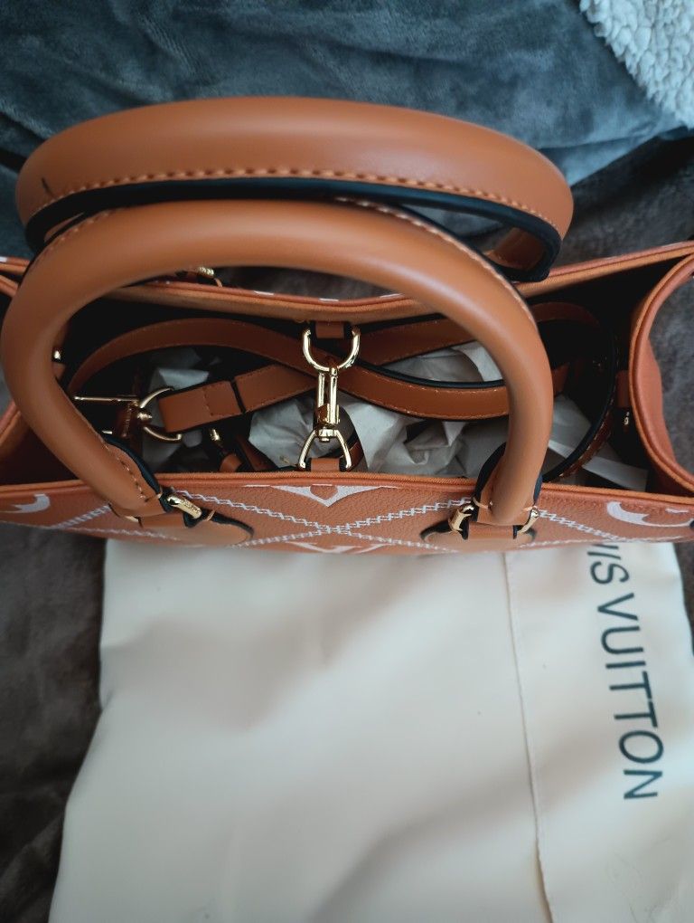 Louis Vuitton On The Go Purse