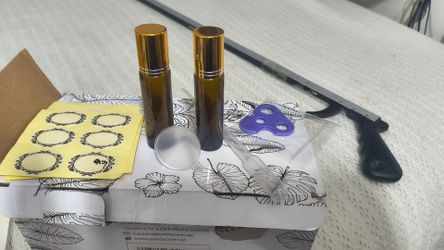 Glass spray bottles sets, essential oil rollers bottles.