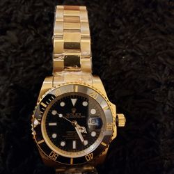 Gold With Black Face