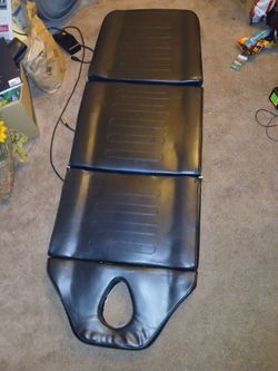 Massage table
