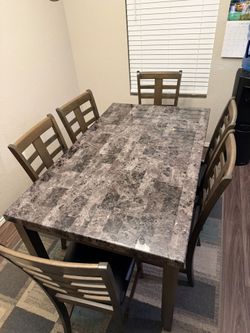 New marble table set with chairs