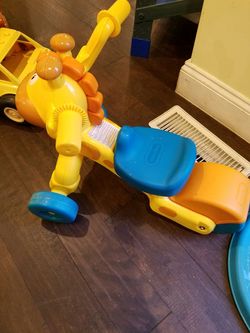 Giraffe sit and scoot trike bike