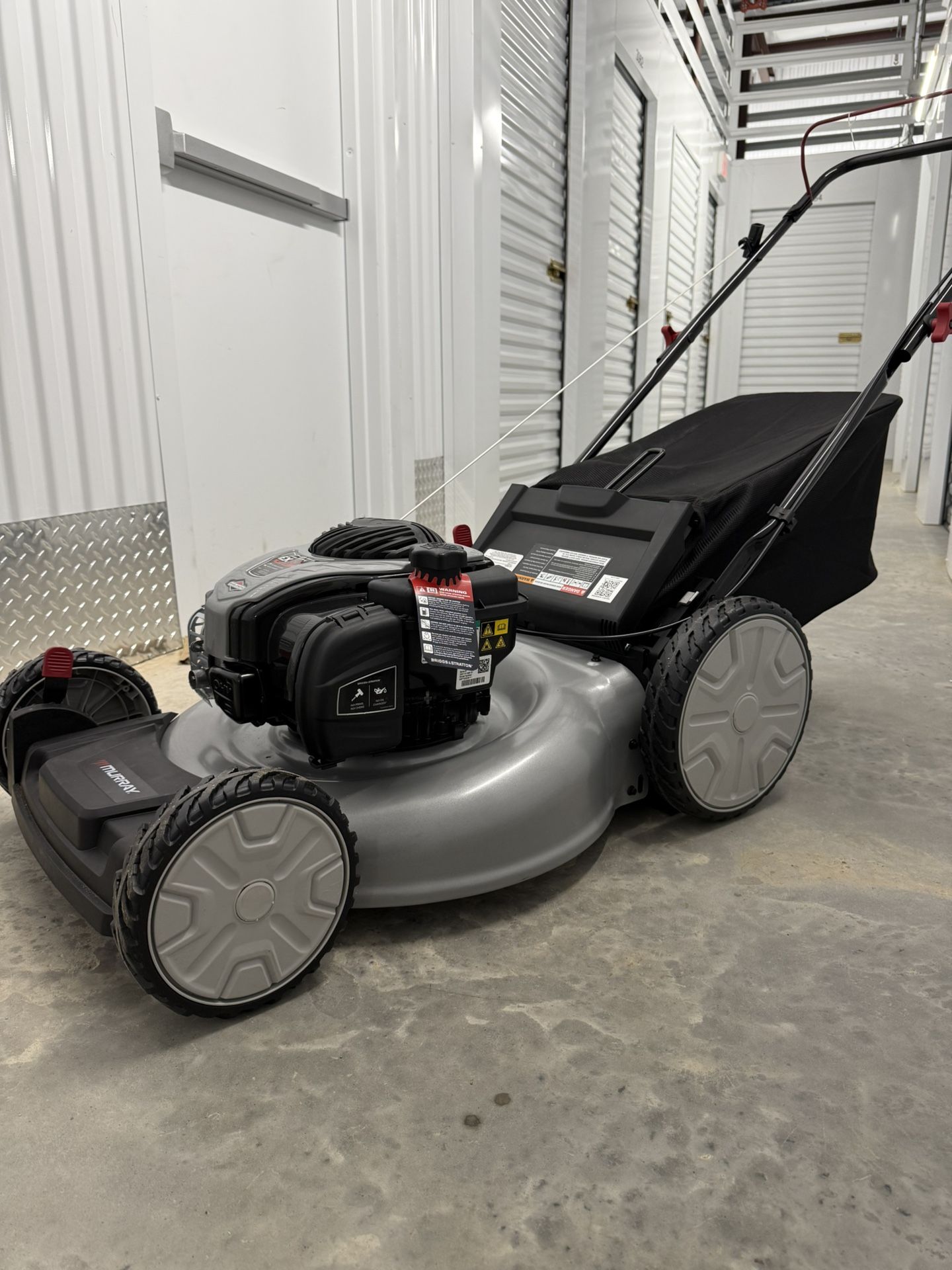 Murray 21 in. 140 cc Briggs and Stratton Walk Behind Gas Push Lawn Mower with Height Adjustment and with Mulch Bag