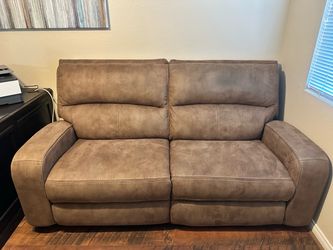Brown faux suede reclining loveseat w/storage compartment! Great shape!