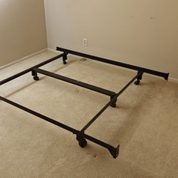 Moving sale! Disassembled Heavy duty Queen size metal bed frame with wheel