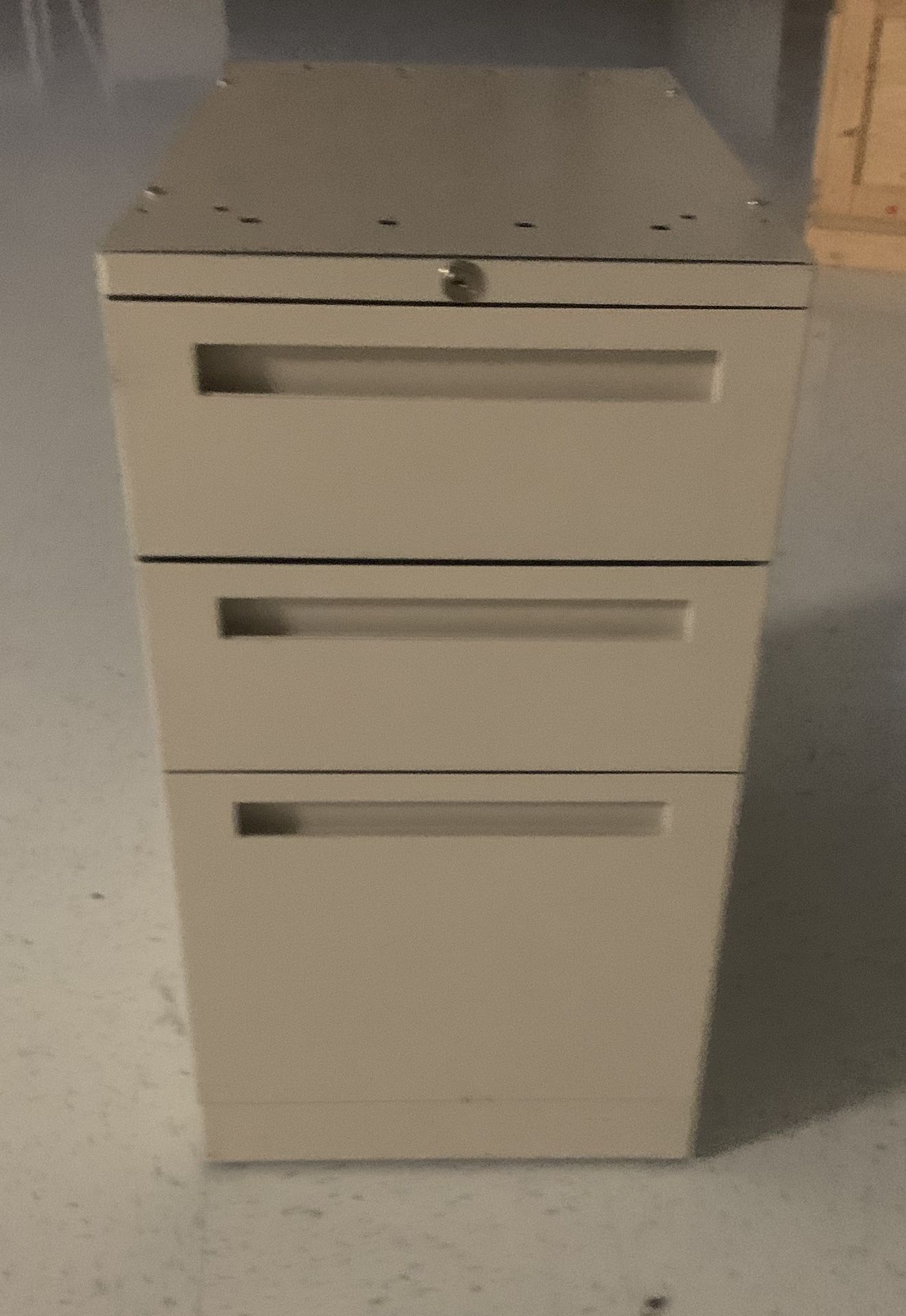 Small three drawer filing cabinet beige