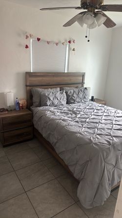 Queen-size bed with mattress and 2 matching nightstands for sale.