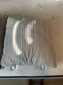 Gray accent pillows