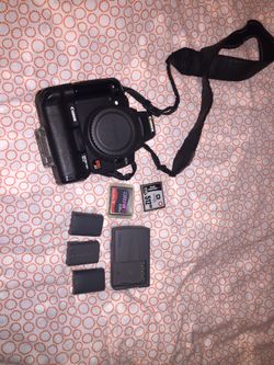 Canon rebel xt, battery grip, 3 batteries, charger, memory cards